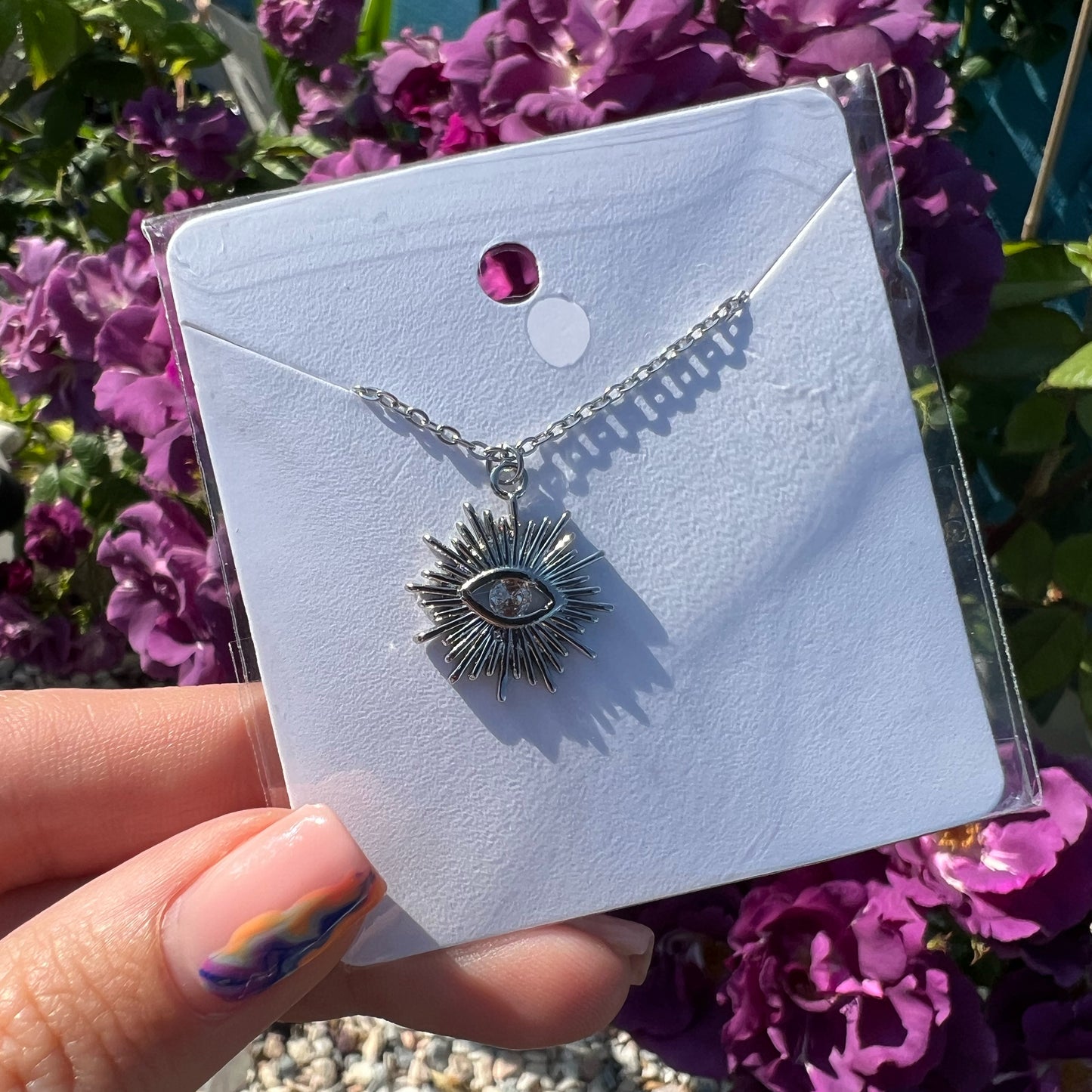 Silver eye necklace